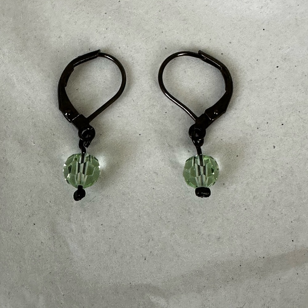 Vintage Dabby Reid wire pierced earrings with green crystal bead dangling 1”.